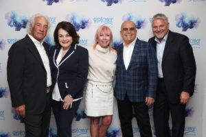 Lydia and David Sarfati with Mario (left) and Cheryl Tricoci (center), Owners of Tricoci University, and Paul Dykstra, CEO of America’s Beauty Show